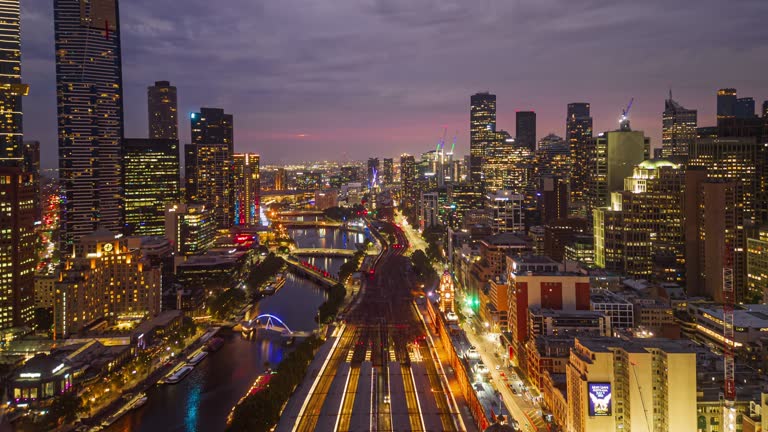 4K Aerial view Day to night Hyper lapse Footage of Central Business District of Melbourne, though Various Famous place over Princes Bridge and Yarra River,Victoria,Australia, Travel and transportation